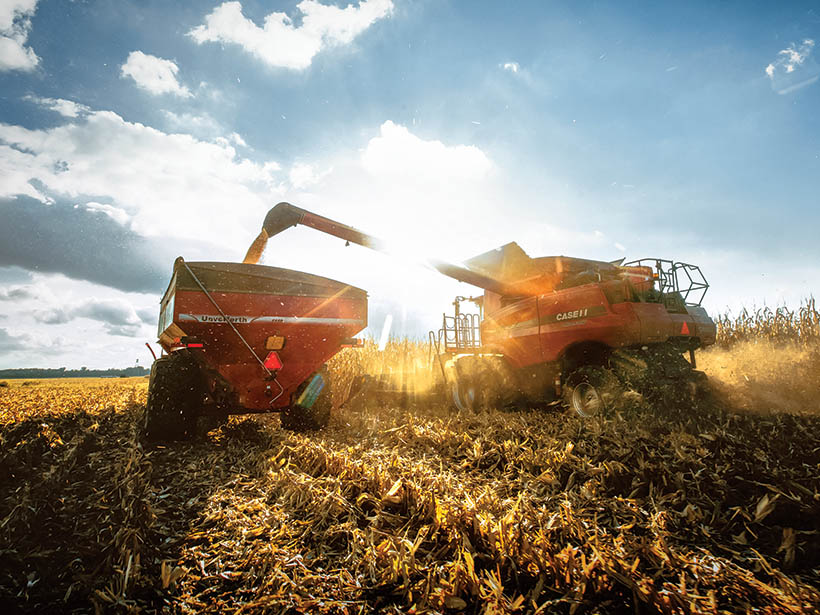 commercialServices-Agriculture-820×615 tractor havesting grain